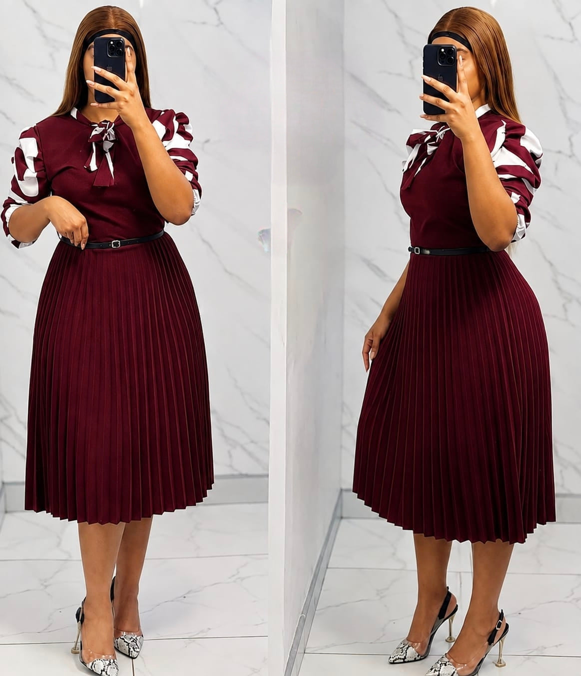 Pleated midi dress featuring puff sleeves, a defined waistline, and a flowing skirt in deep burgundy.