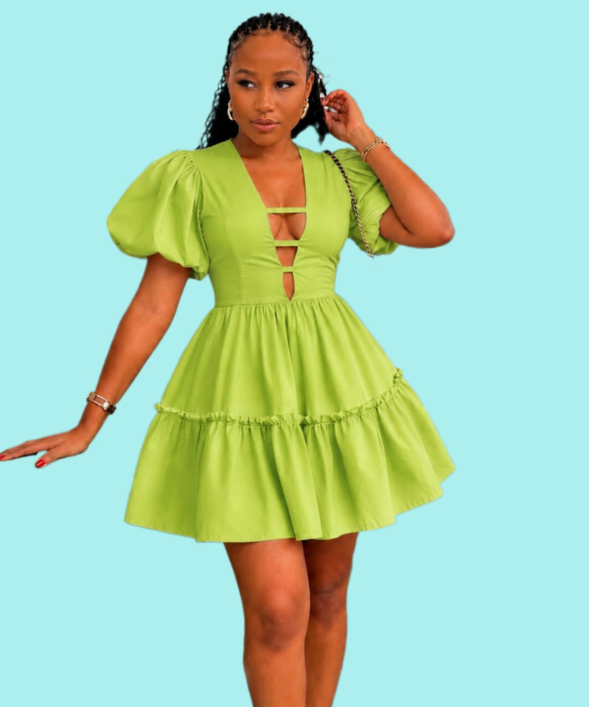 Vibrant green puff sleeve mini dress with a deep V-neckline and tiered ruffle skirt, enhancing a fitted waist.
