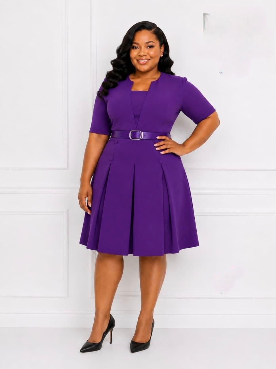 Solid purple pleated midi dress with a structured bodice, short sleeves, and a metallic buckle belt.