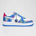 Nike Air Force 1 Low white and multicolour checkered denim sneakers with blue sole and light-blue laces.