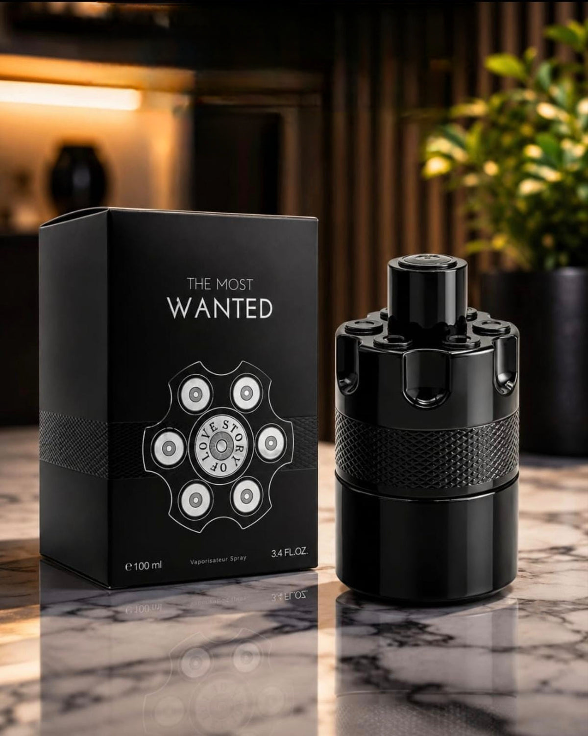 Black cylindrical bottle of The Most Wanted eau de Parfum 100ml by Ovadue, presented in a stylish black box.