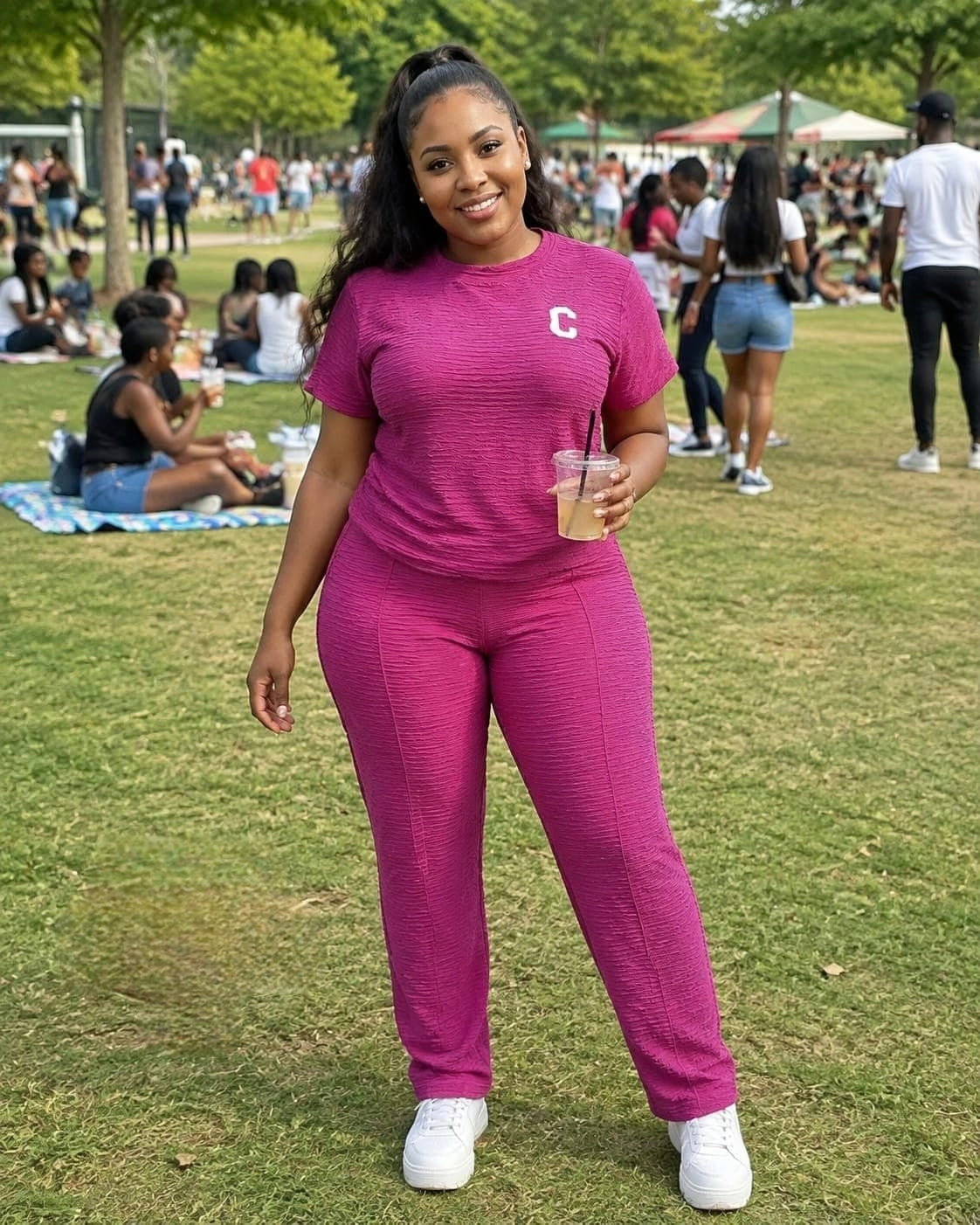 Model wearing a textured short-sleeve top with a bold emblem and straight-leg pants in a vibrant color, paired with white sneakers outdoors.