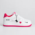Nike Air Force 1 Low White Hot Pink PLAY sneakers with pebbled leather, grey suede, pink heart detail and black Nike charm | Ovadue