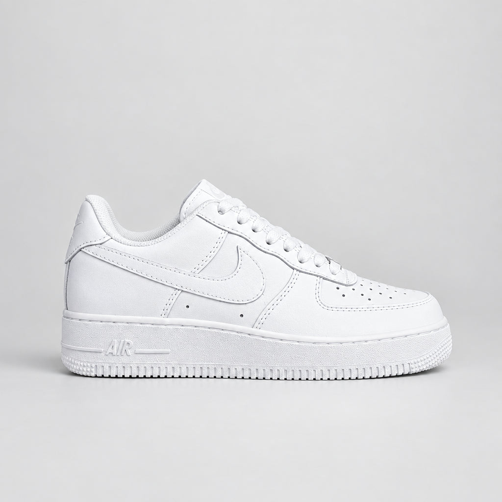 Triple white Nike Air Force 1 Low with smooth white leather, tonal Swoosh and classic AIR branding | Ovadue
