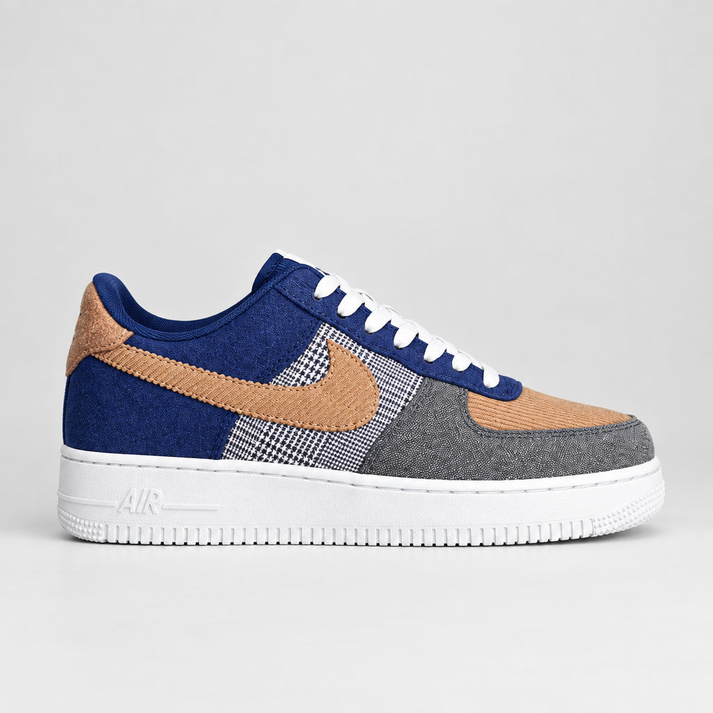 Nike Air Force 1 Low-inspired navy and camel patchwork sneakers with corduroy swoosh, grey denim-style panels and black-and-white houndstooth accents.