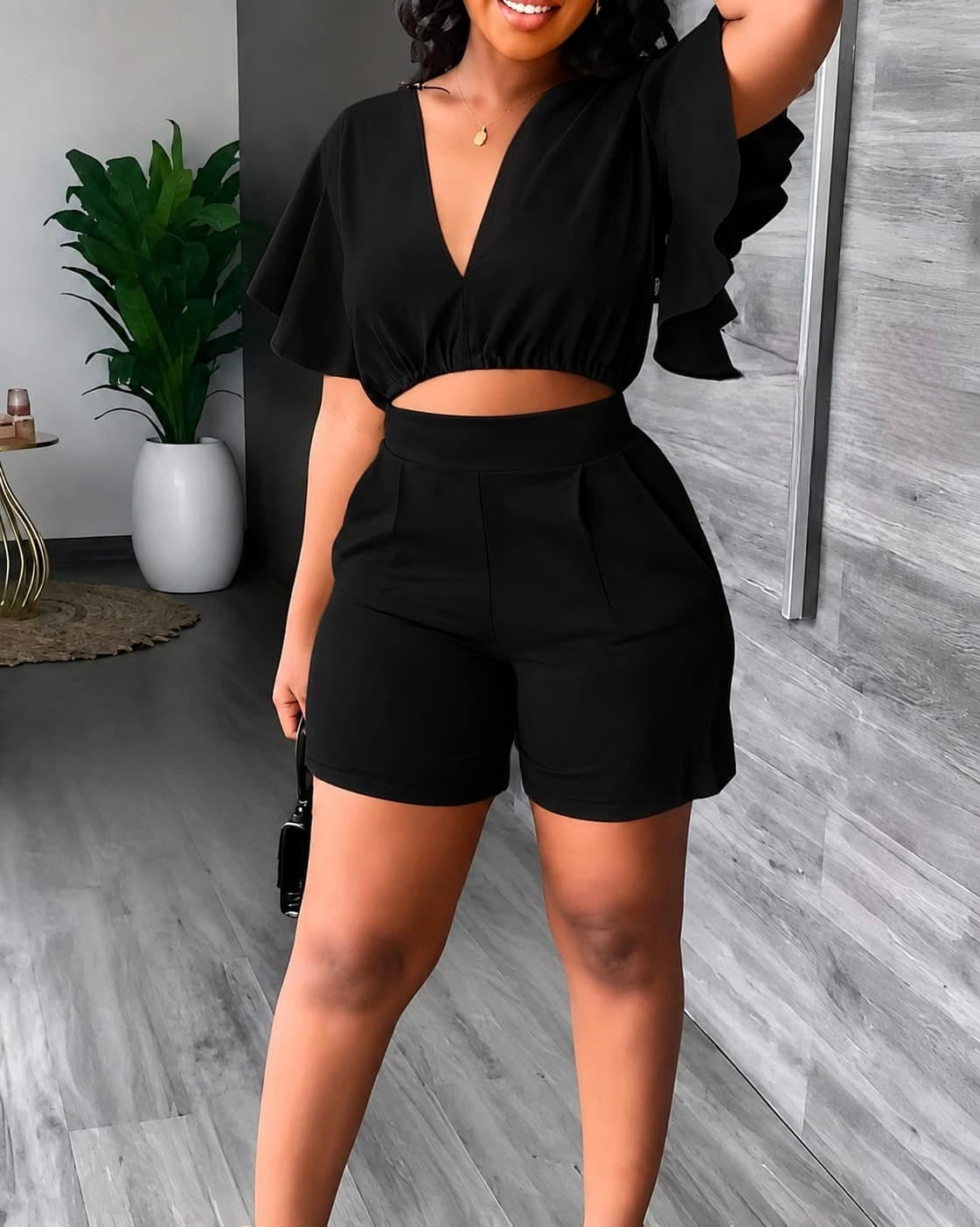 Black Flutter Sleeve Crop Top with Deep V-Neck and High-Waist Shorts Set.