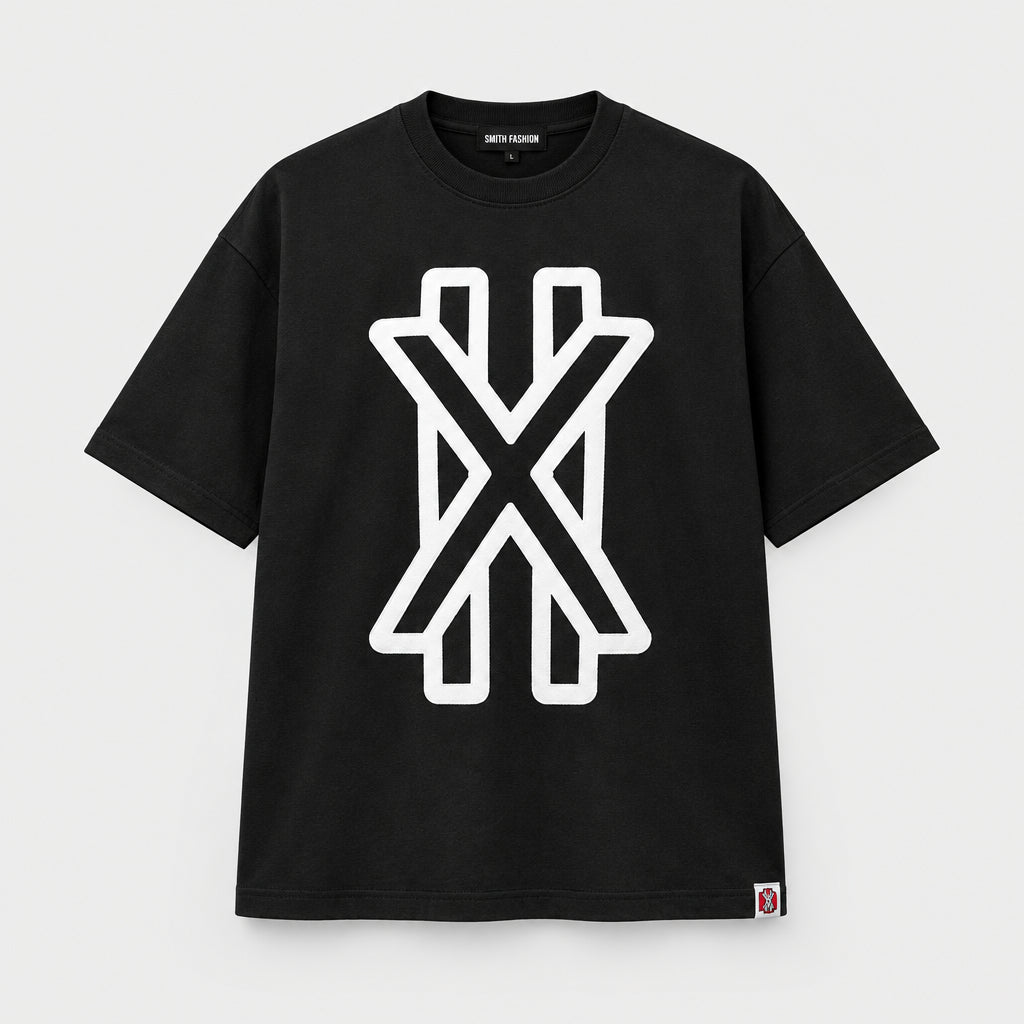 Galxboy Oversized X Graphic Tee in black with a bold white outlined X graphic, dropped shoulders and a ribbed crew neck.